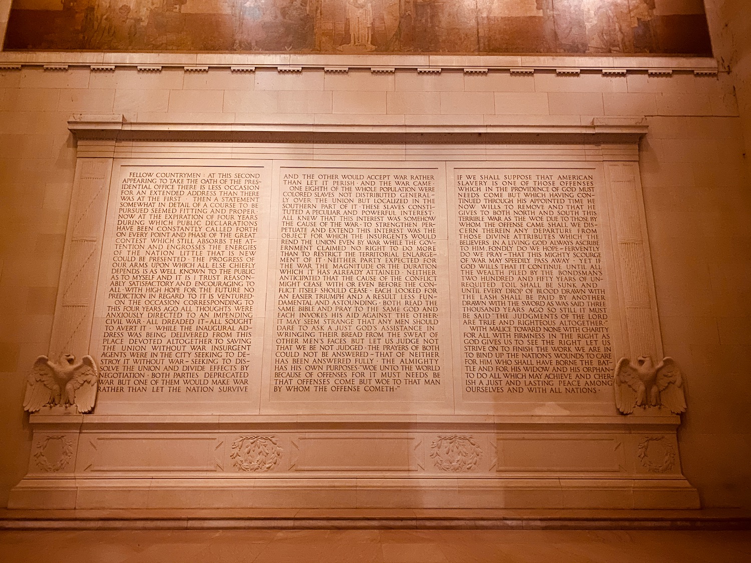 a wall with carved letters