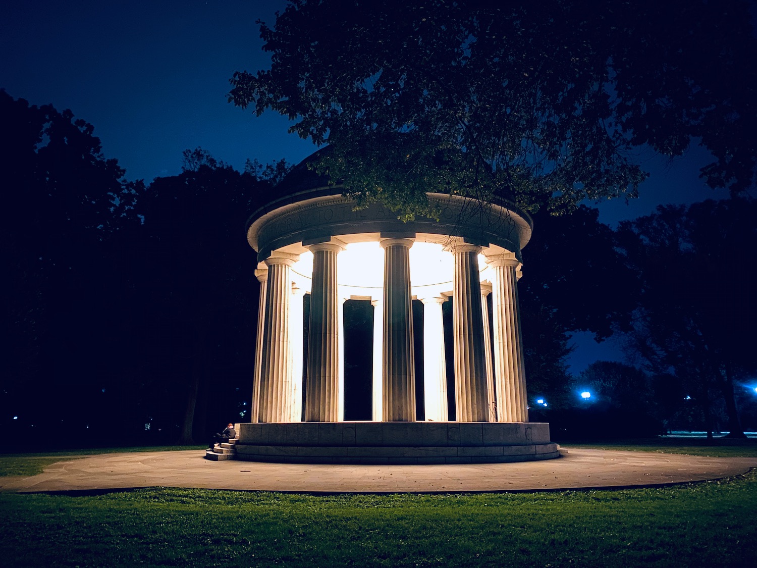 a lit up gazebo at night