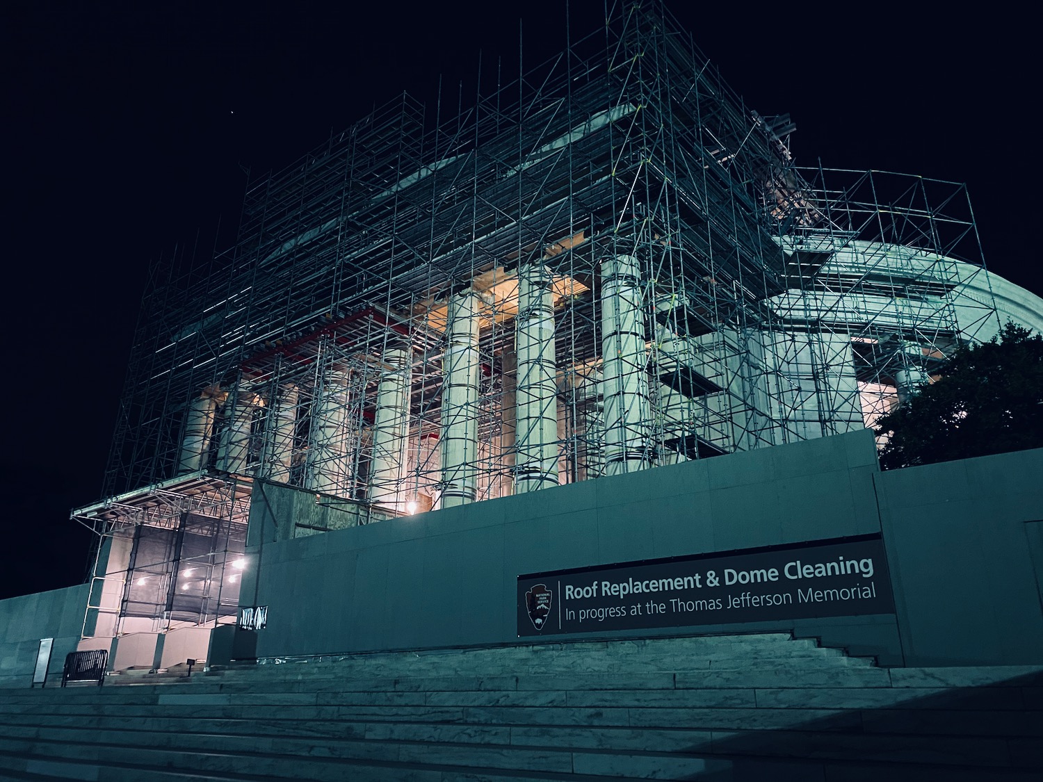 a building under construction at night