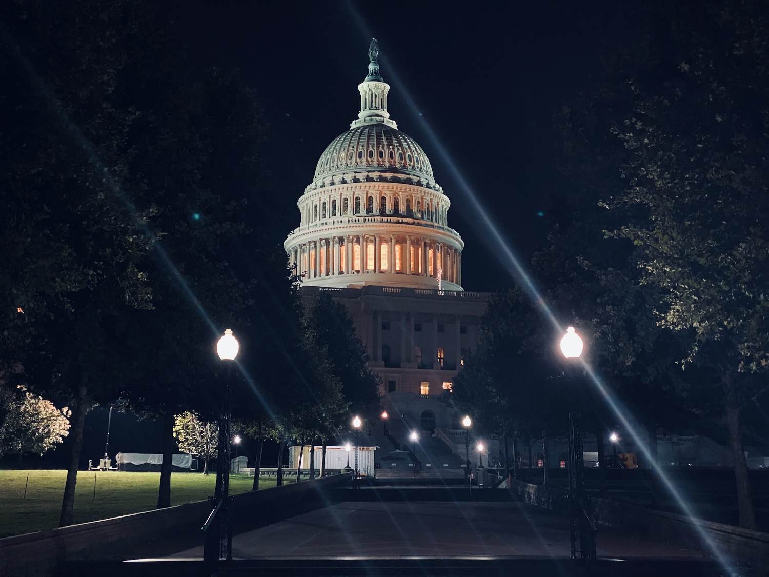 a building with a dome at night