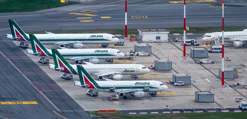 airplanes parked on a runway