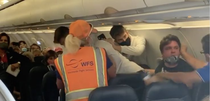 a group of people on an airplane