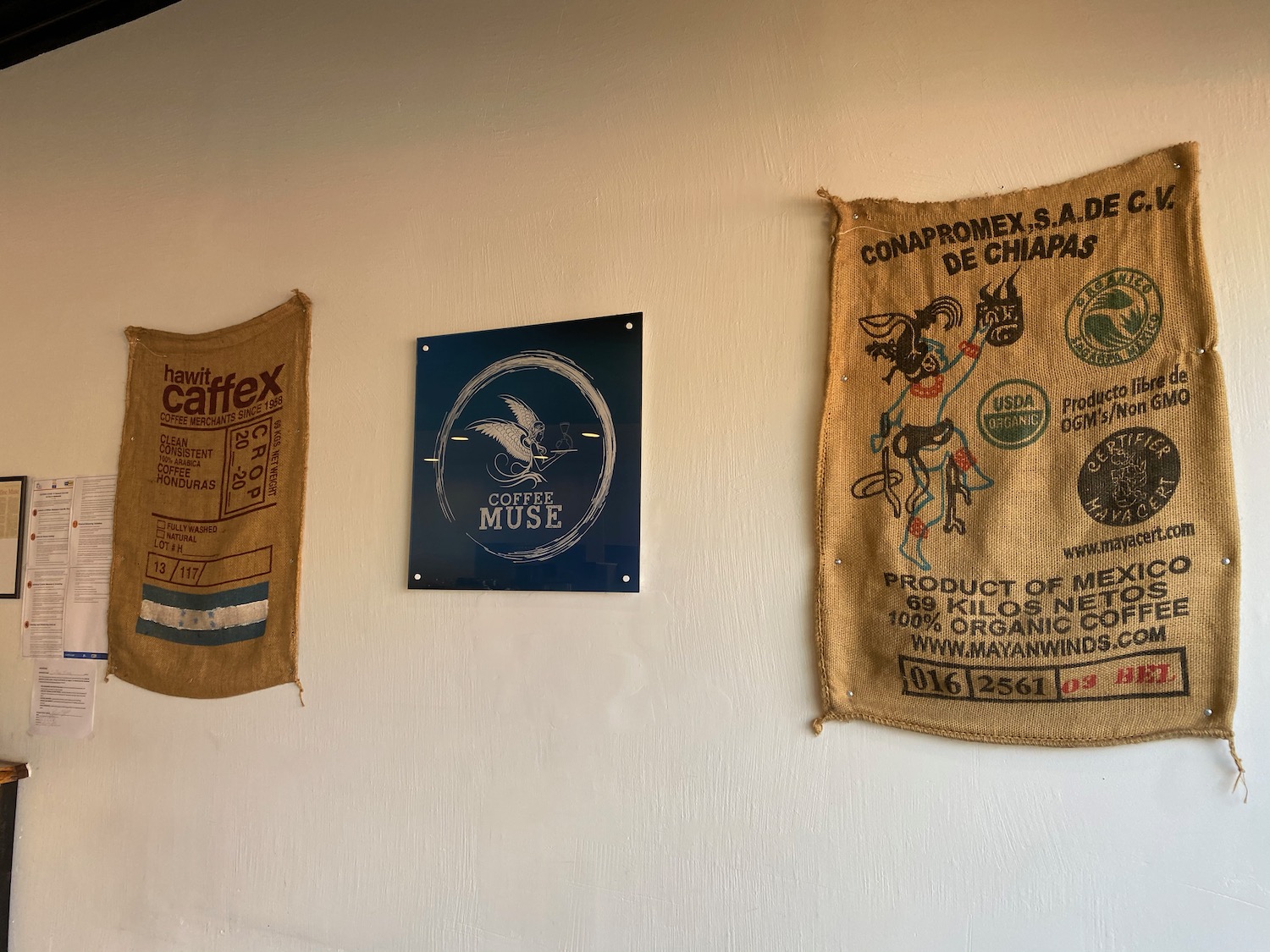 a group of burlap sacks on a wall