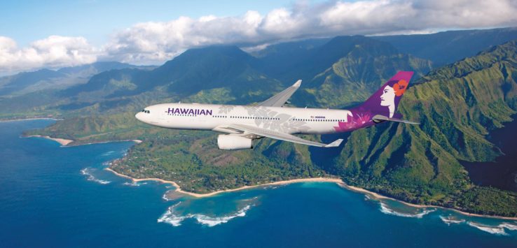 an airplane flying over a body of water