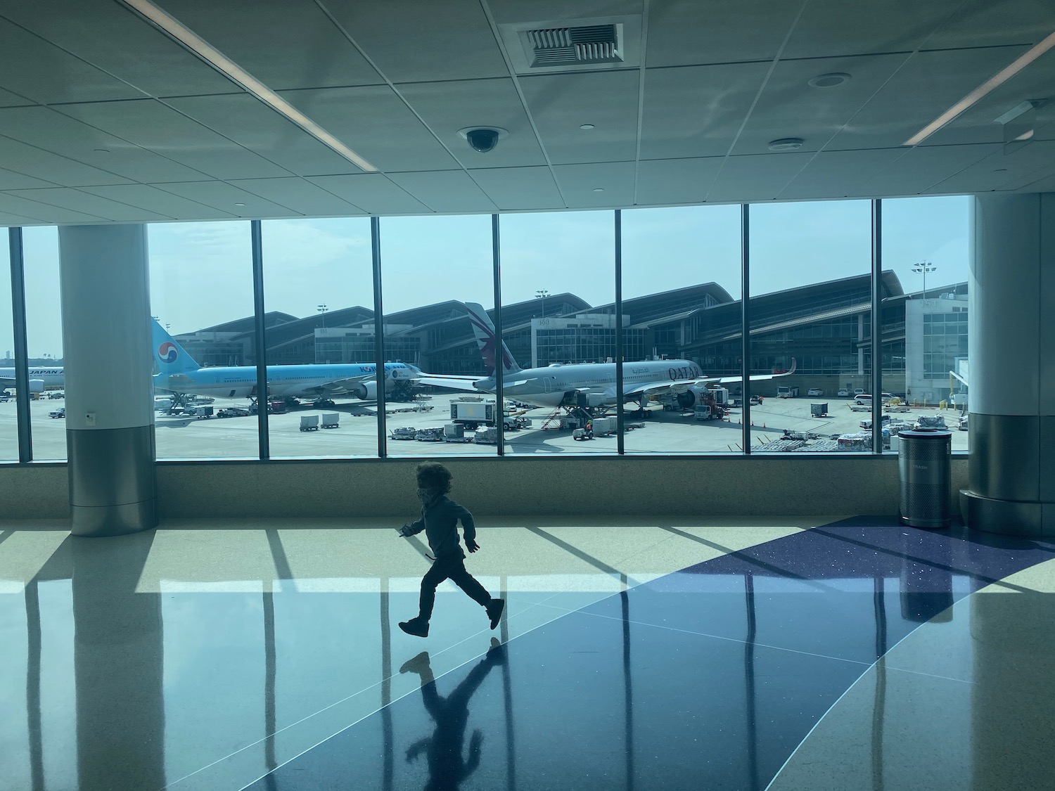 a child running in an airport