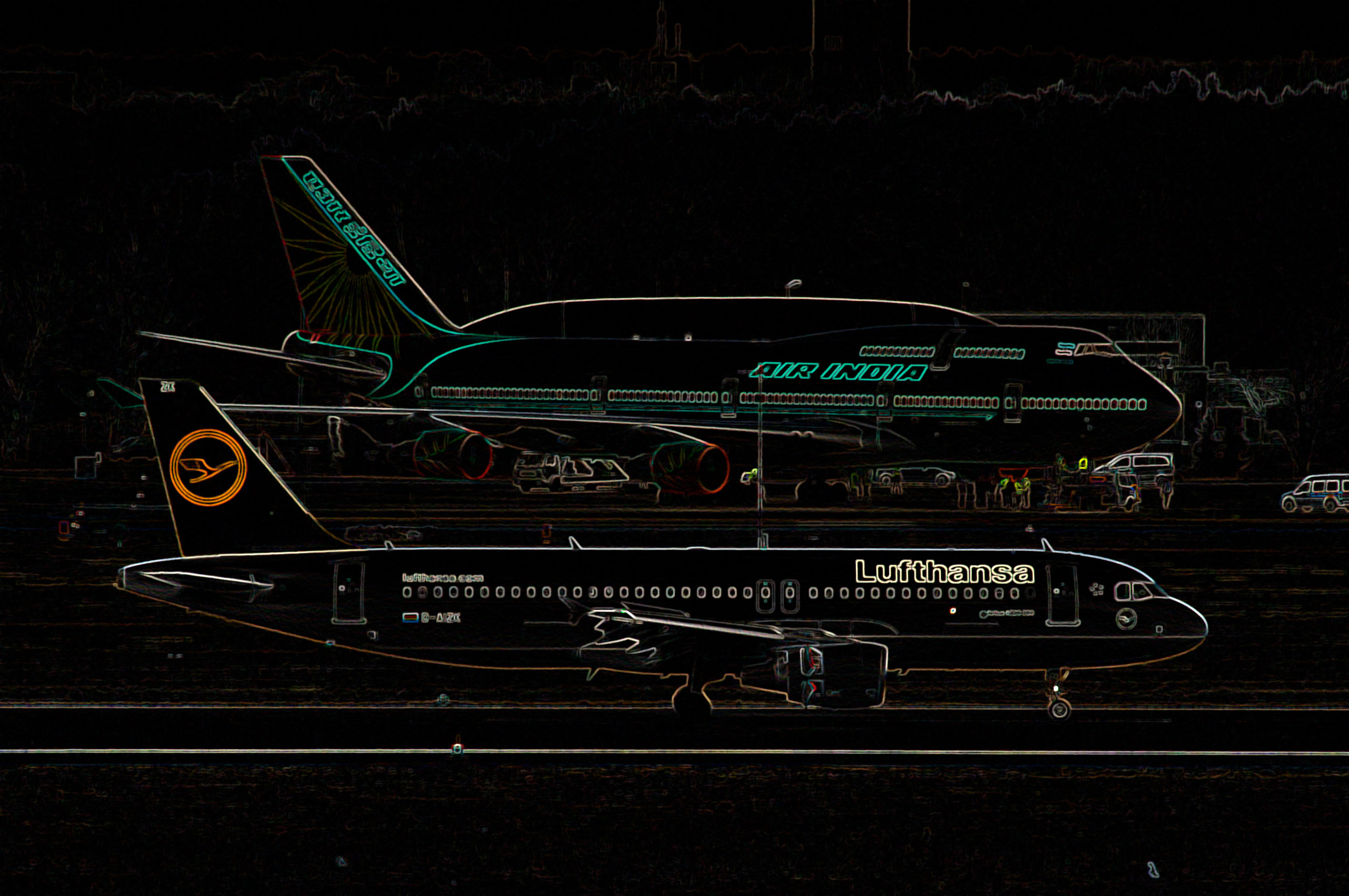 a group of airplanes on a runway