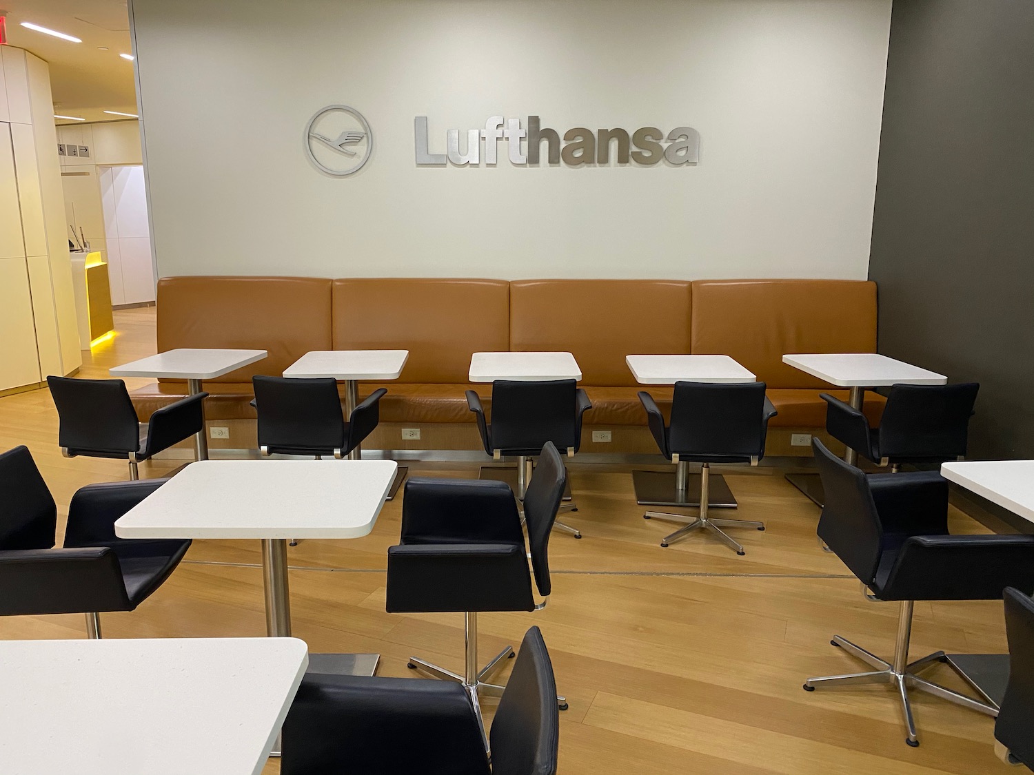 a group of tables and chairs in a room