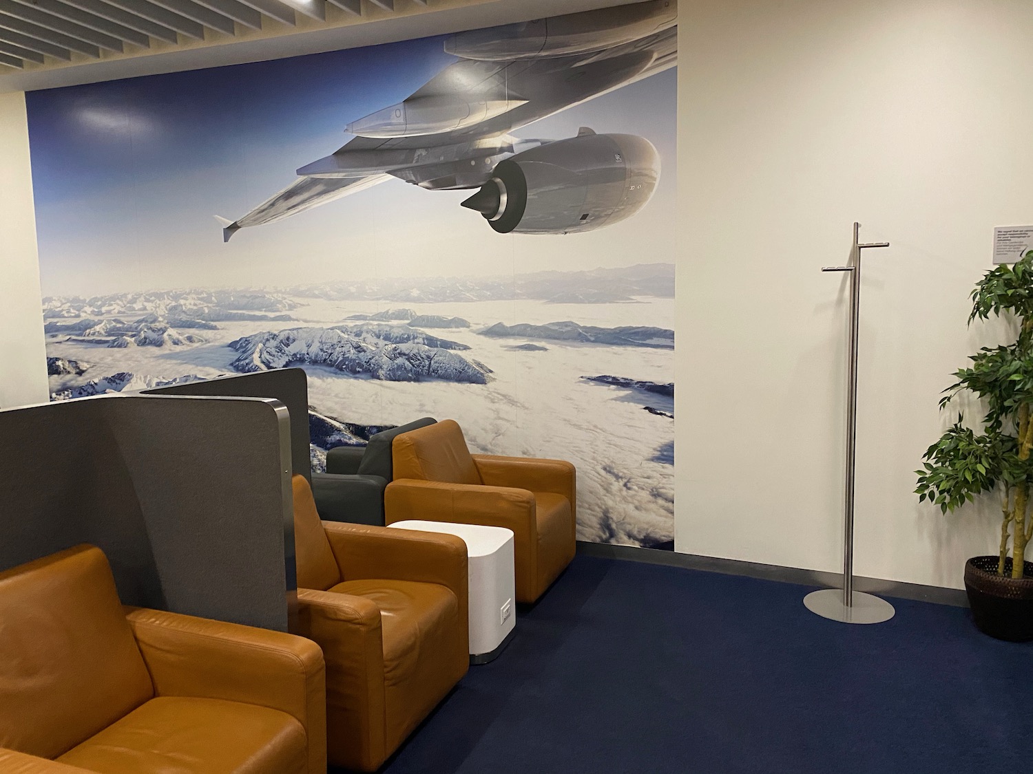 a room with a wall mural of an airplane and a plane