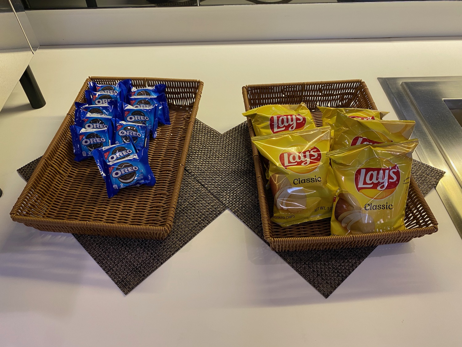 two baskets of chips and chips