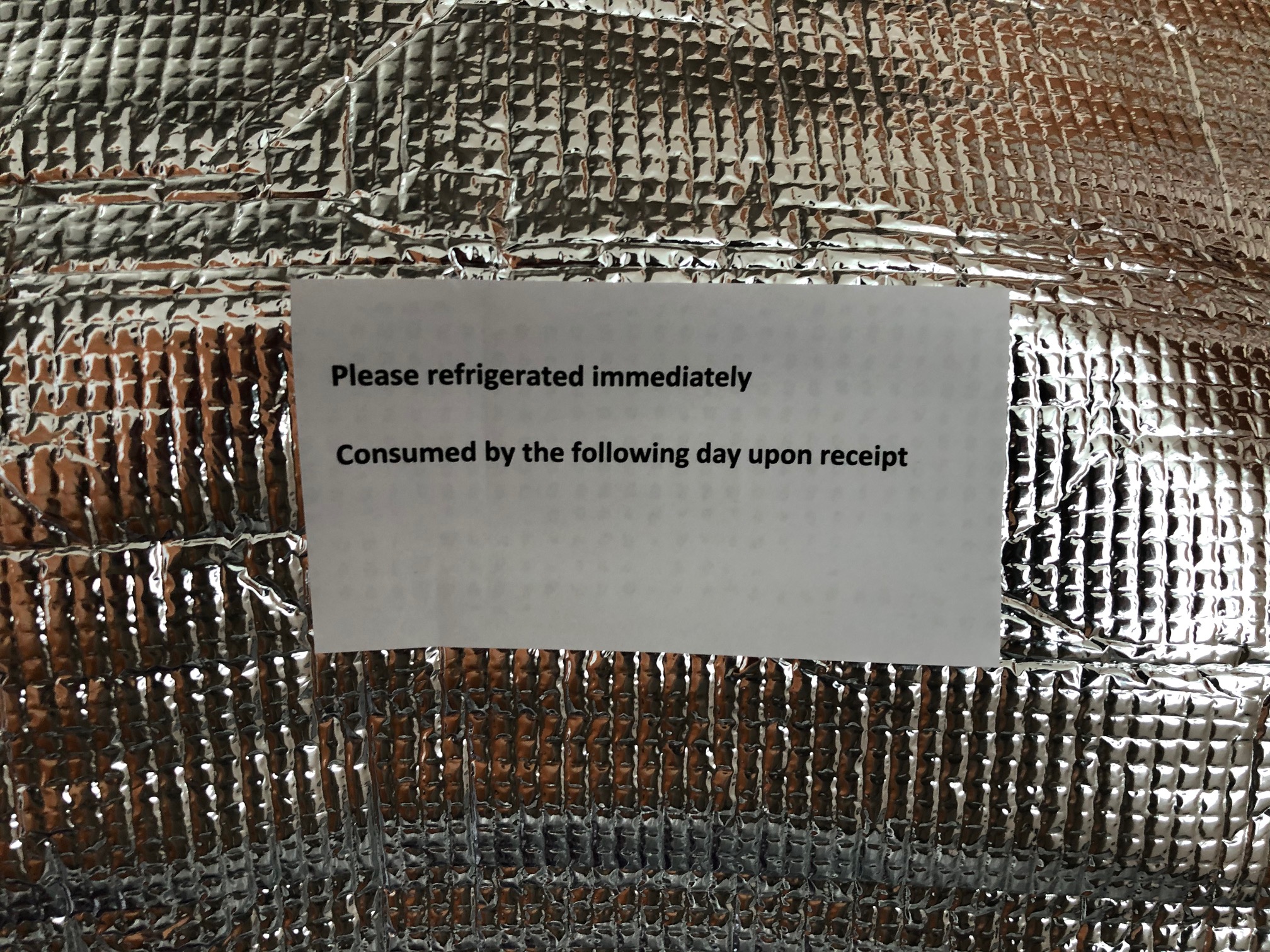 a sign on a foil surface