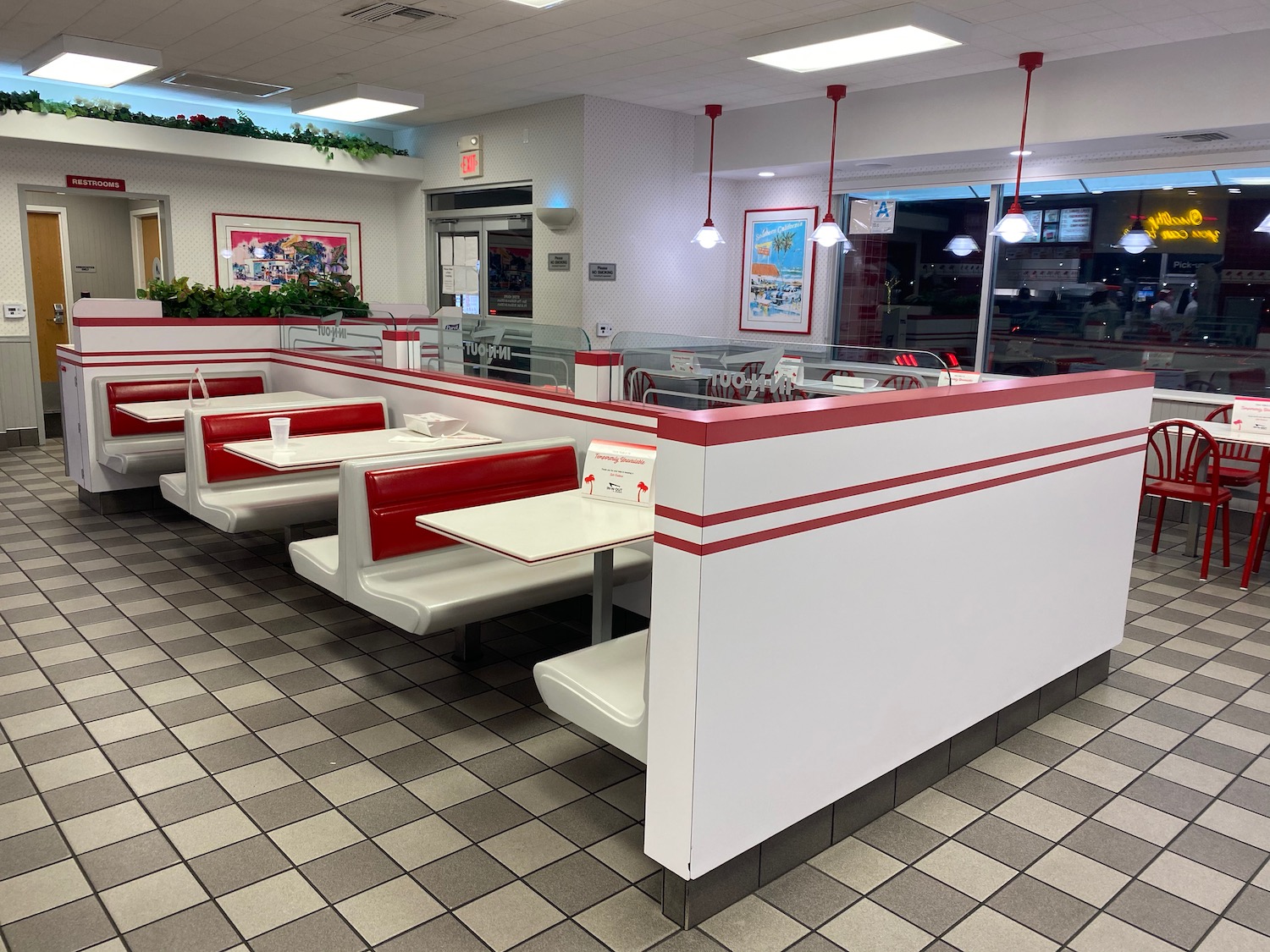 a white and red booth seating in a restaurant