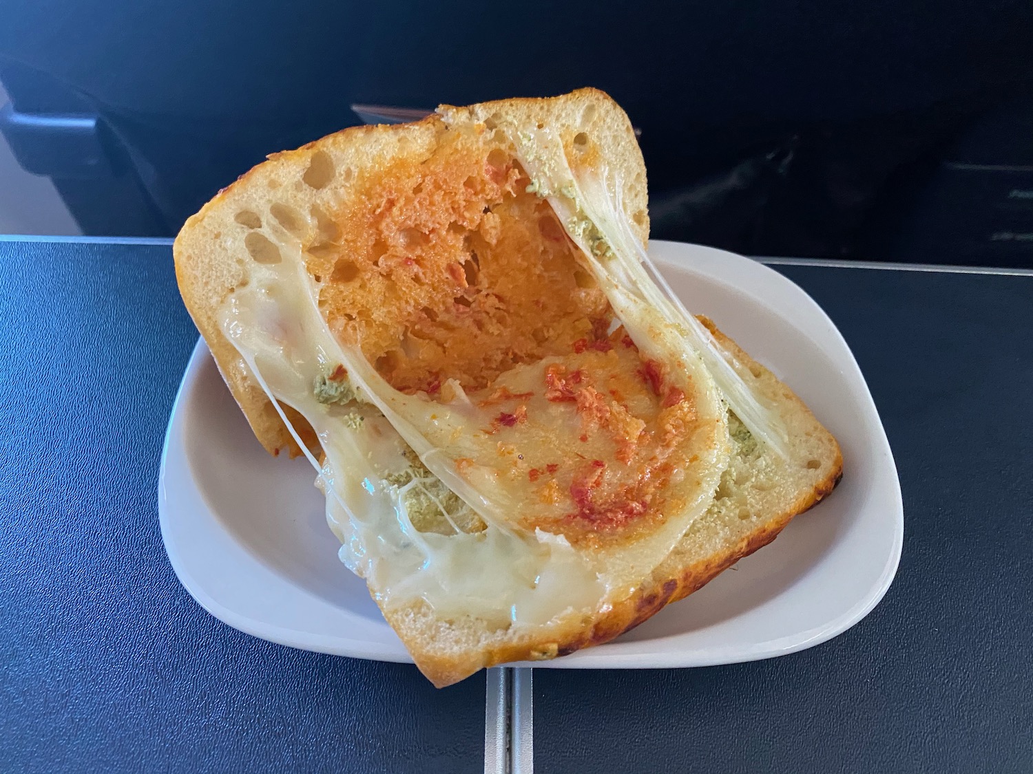 a piece of bread with cheese on it
