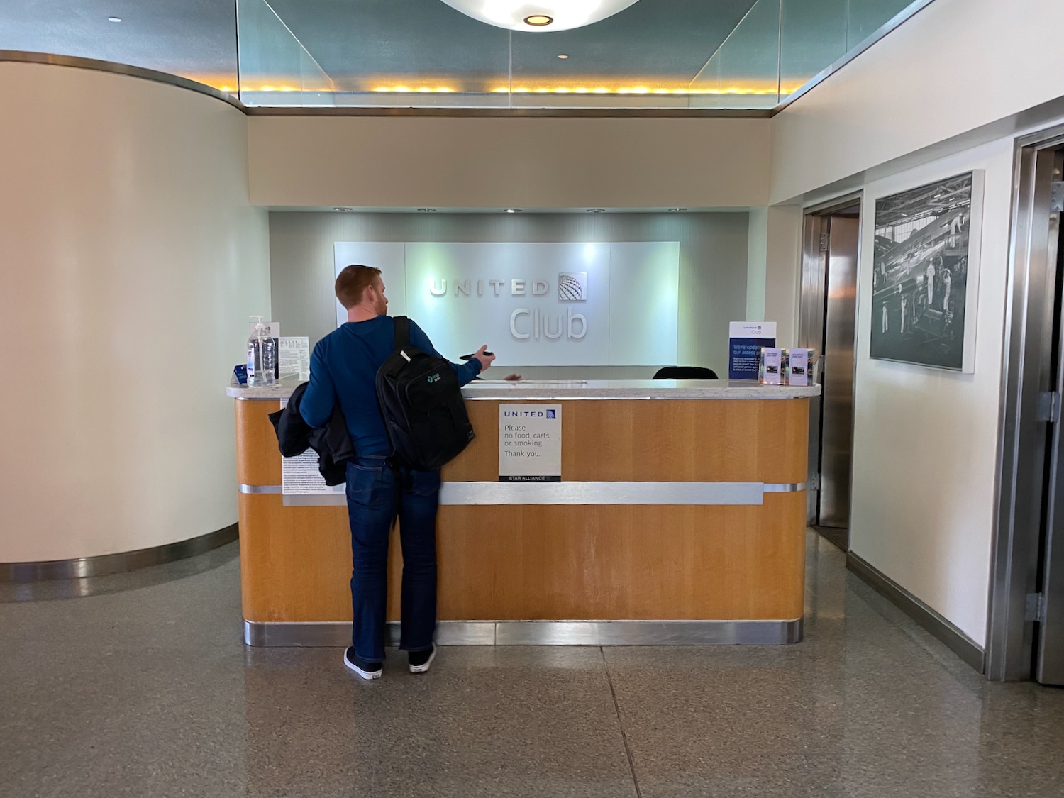 a man standing at a desk