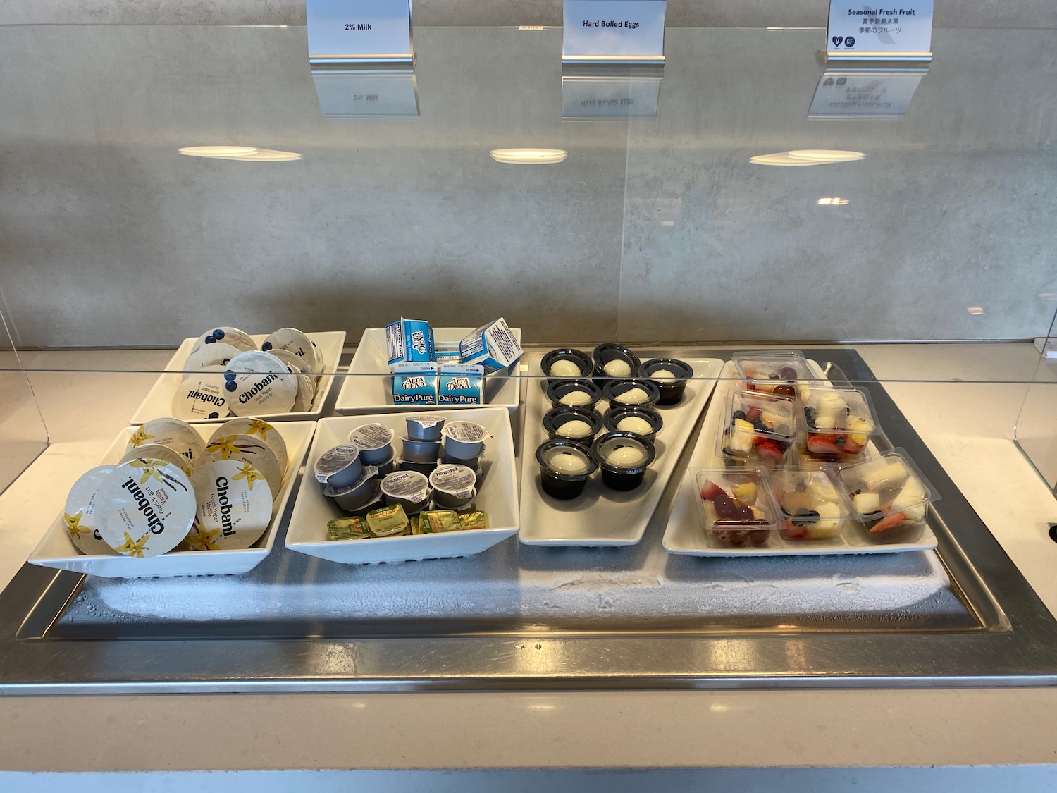 a trays of food on a counter