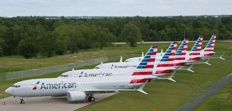 airplanes parked on a runway