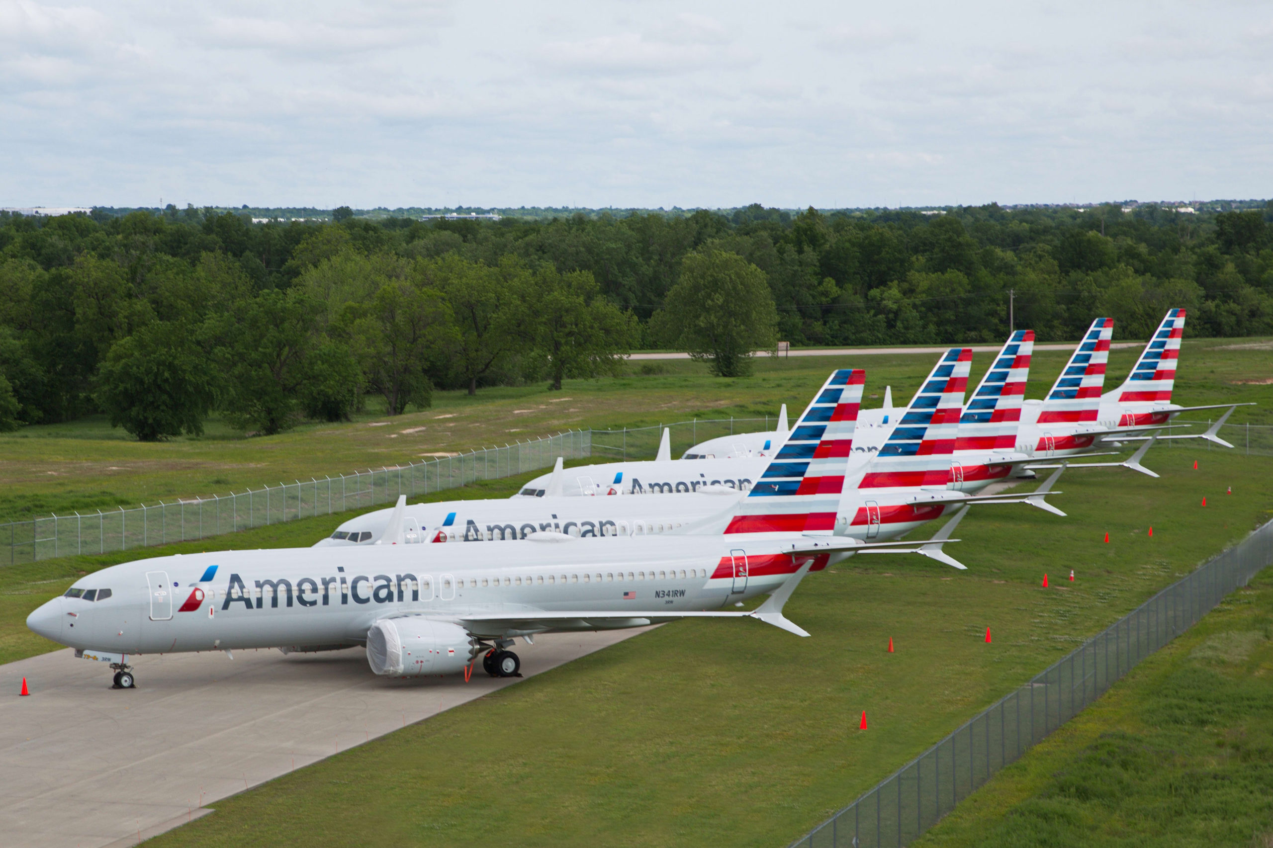 airplanes parked on a runway