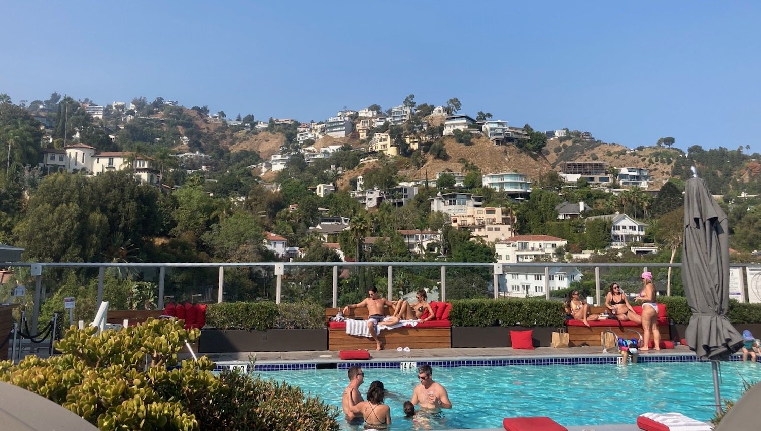 a group of people sitting in a pool