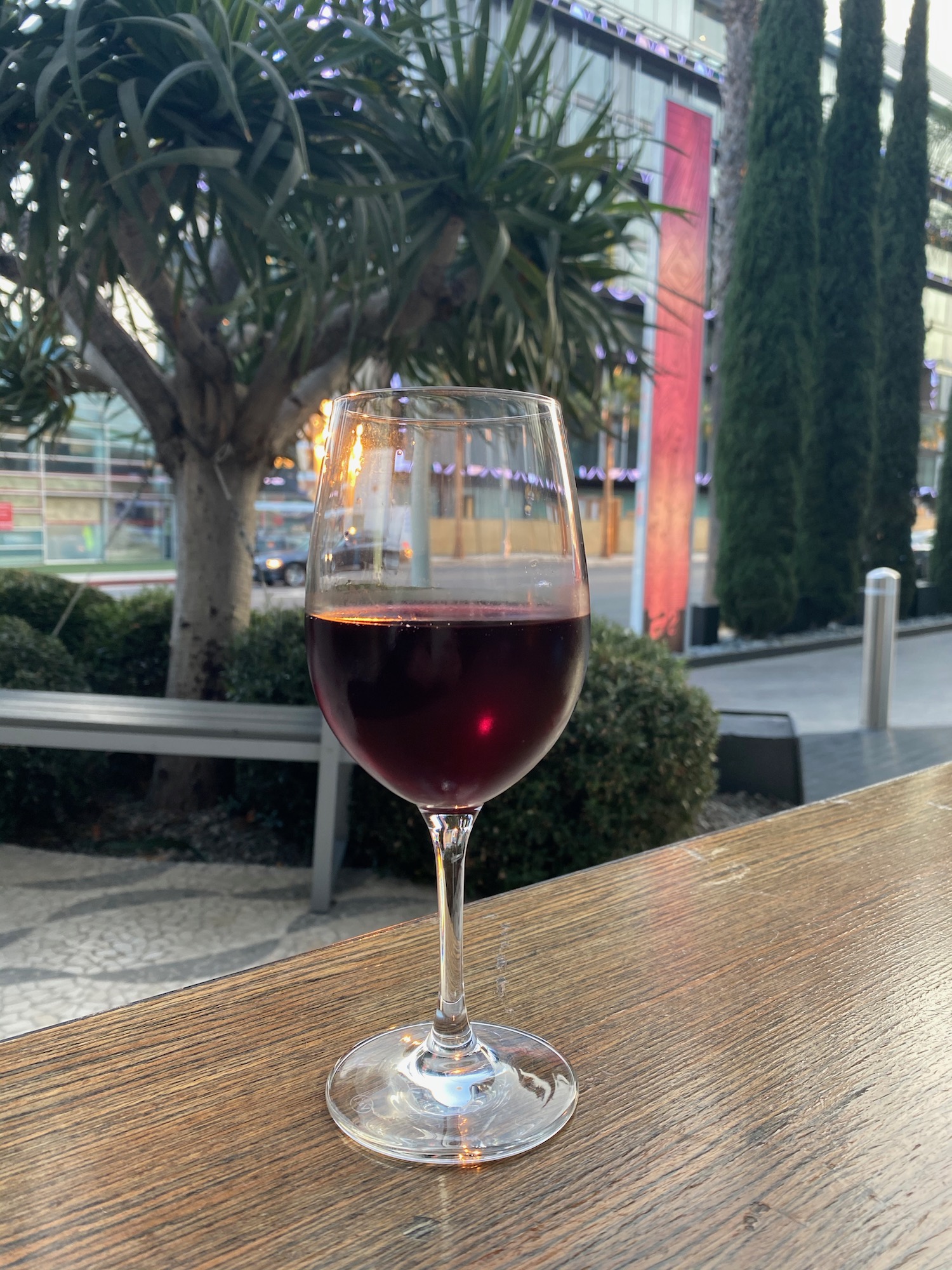 a glass of wine on a table