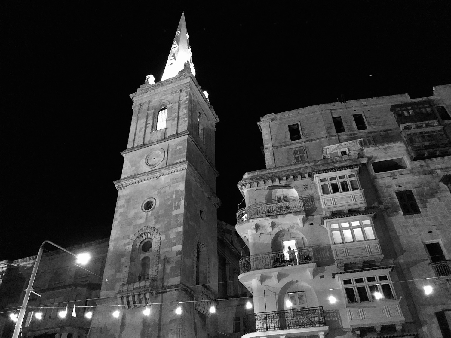 a building with a tower and a light on top