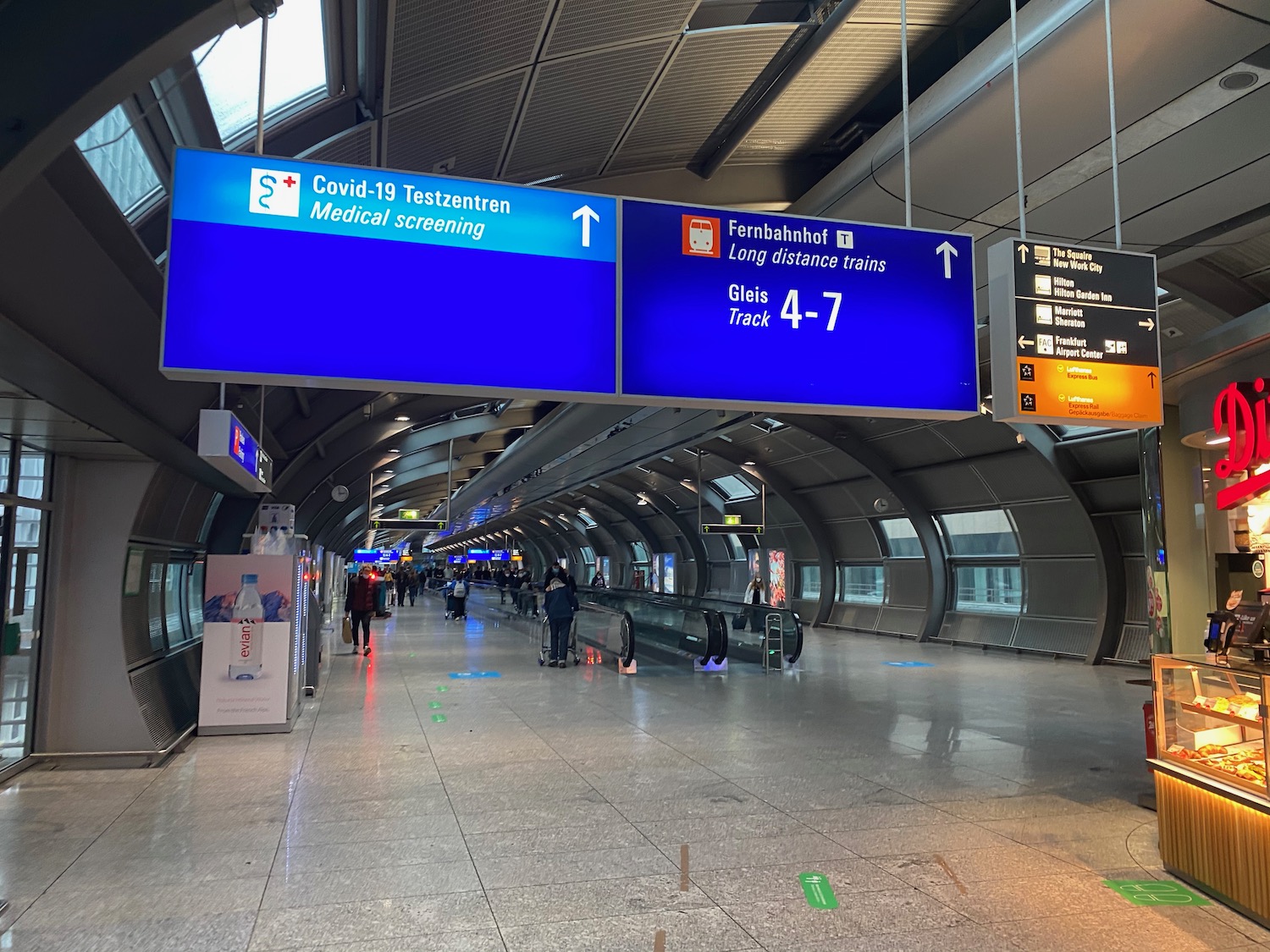 a blue sign in a tunnel