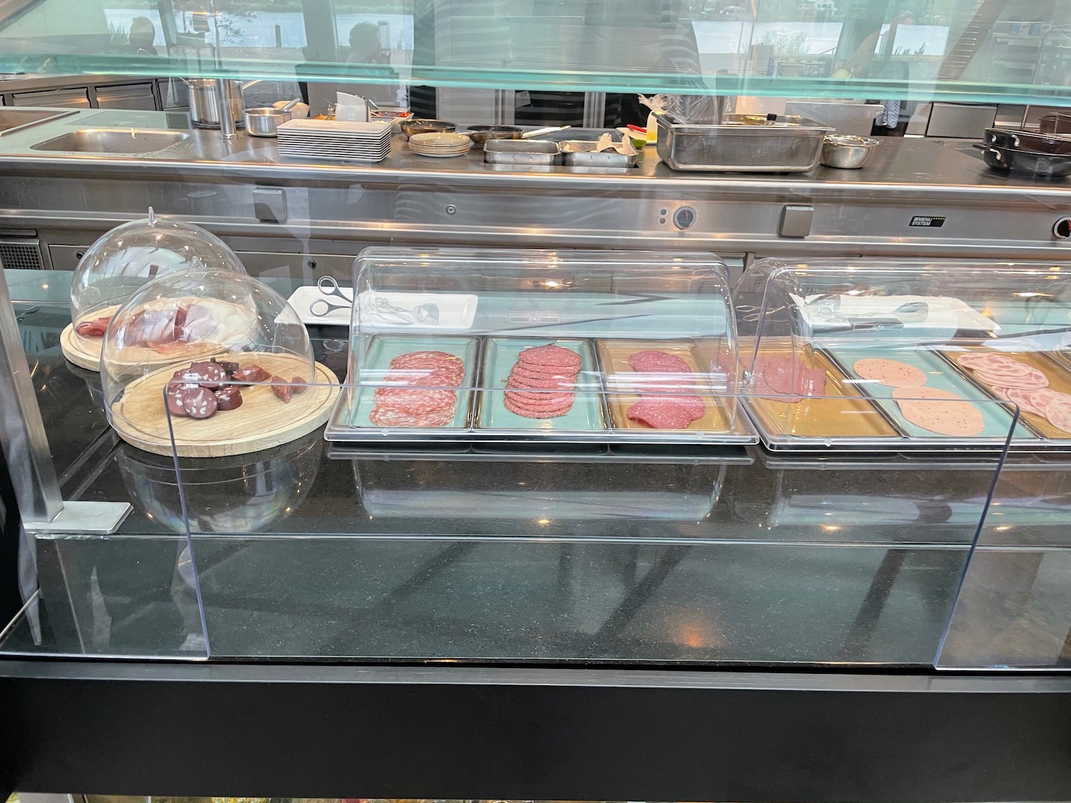 a display case with different types of meats