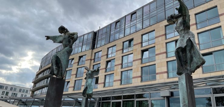 statues in front of a building