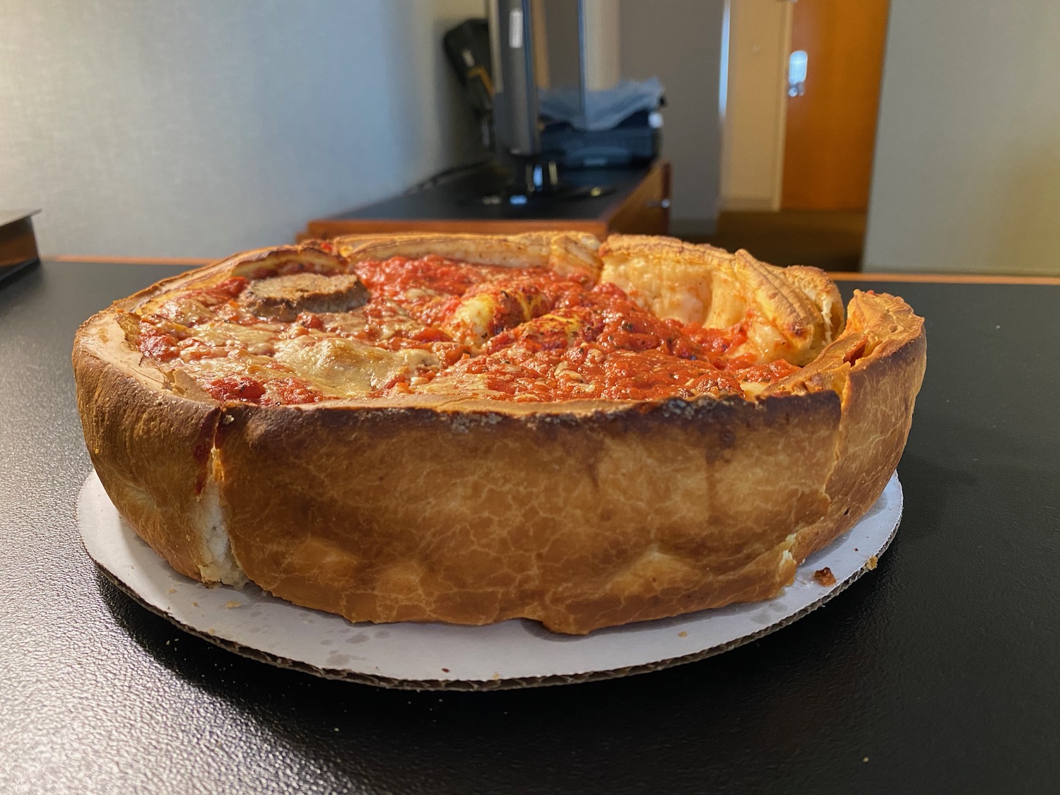 a deep dish pizza on a plate