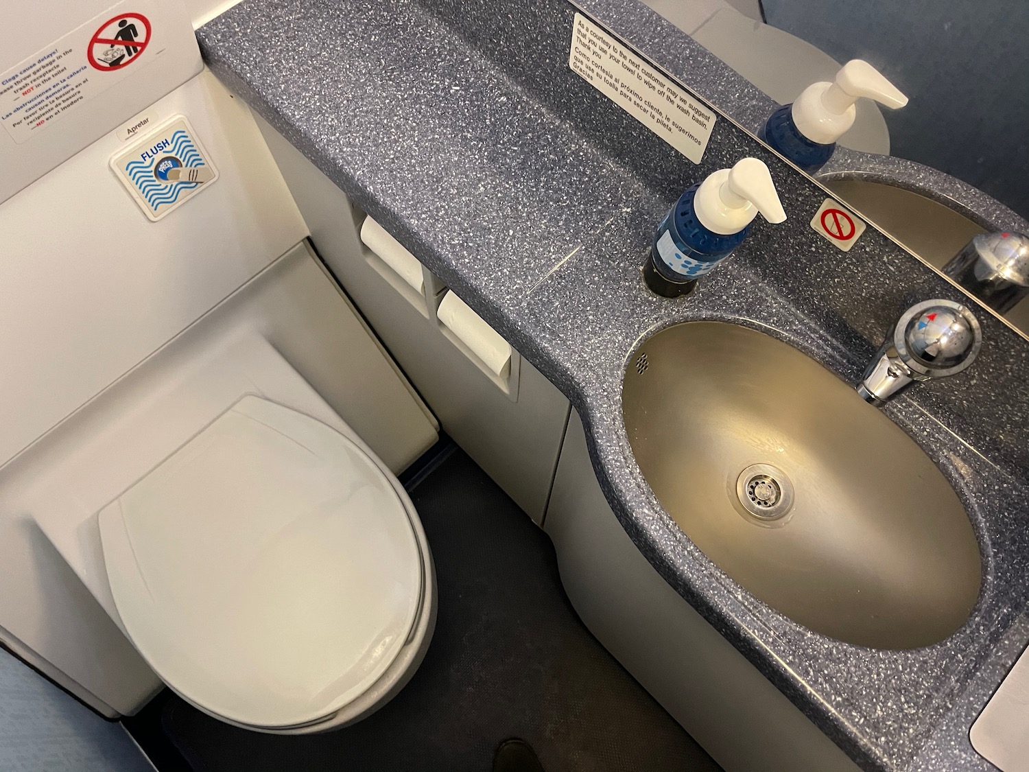 a sink and toilet in a bathroom