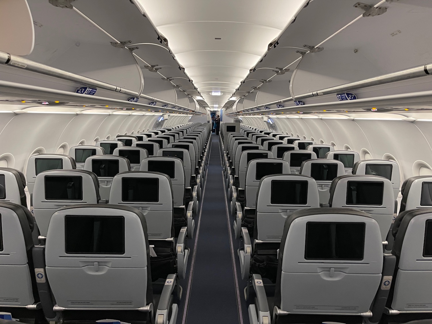 an airplane with rows of seats