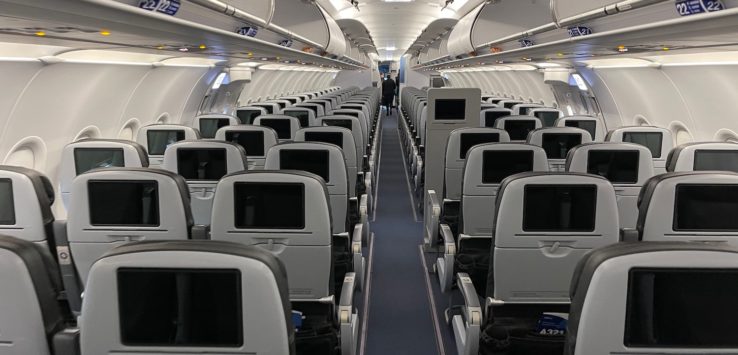 an airplane with rows of seats