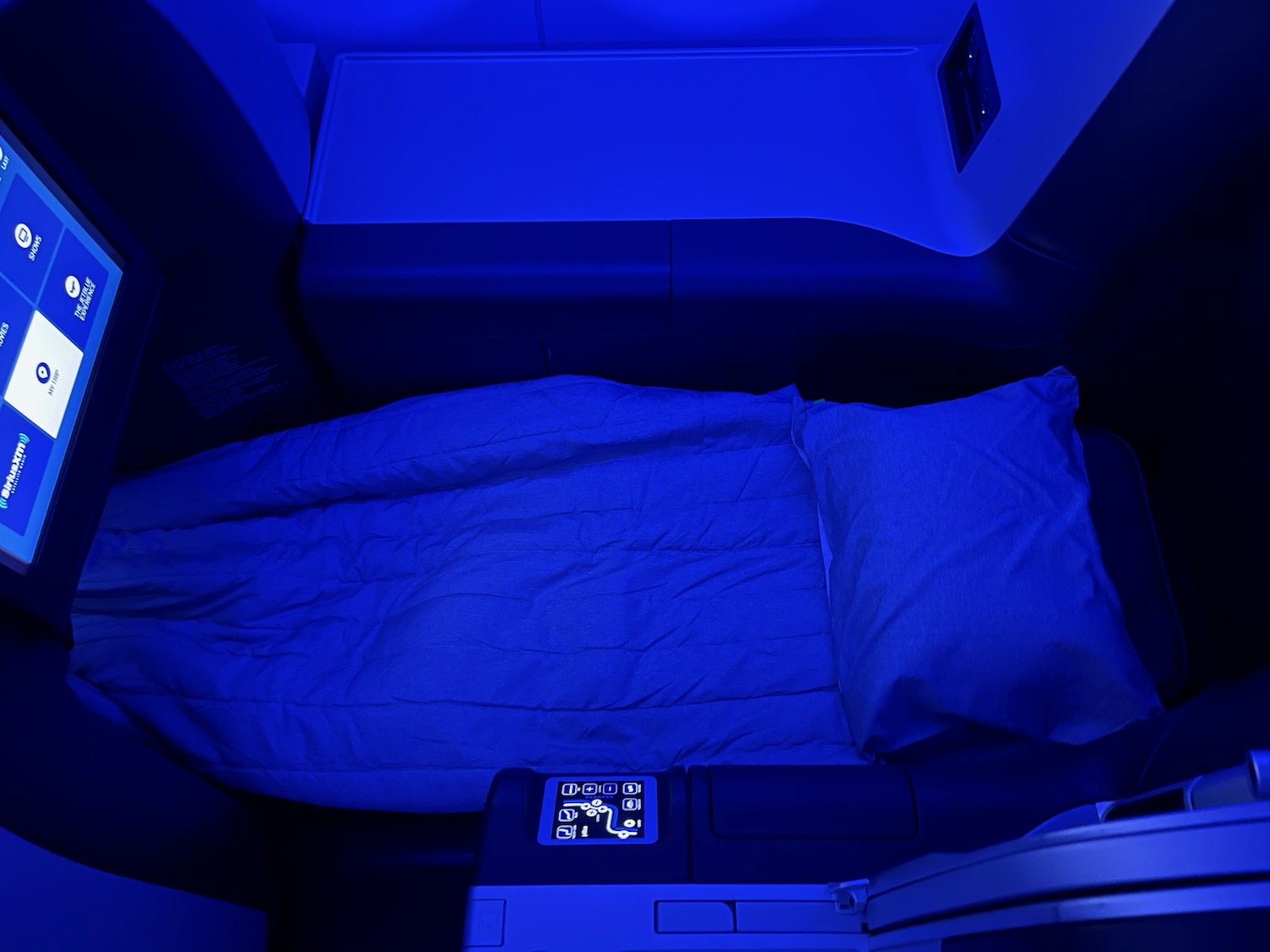 a bed in a plane