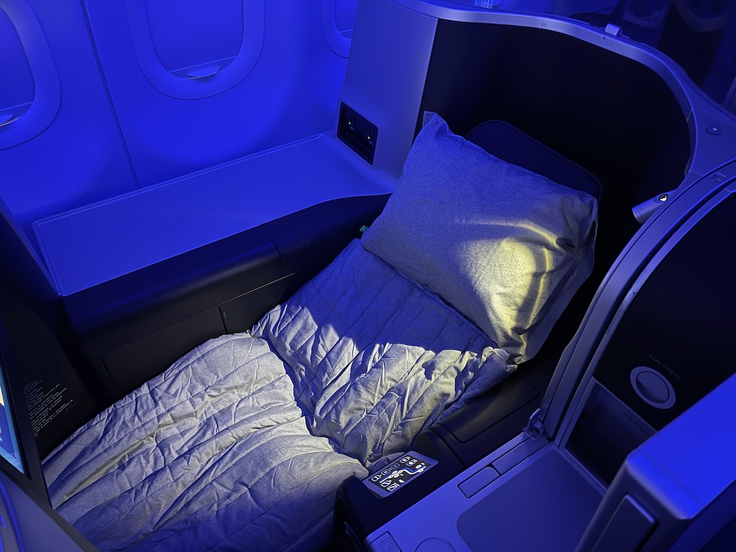 a bed in a plane