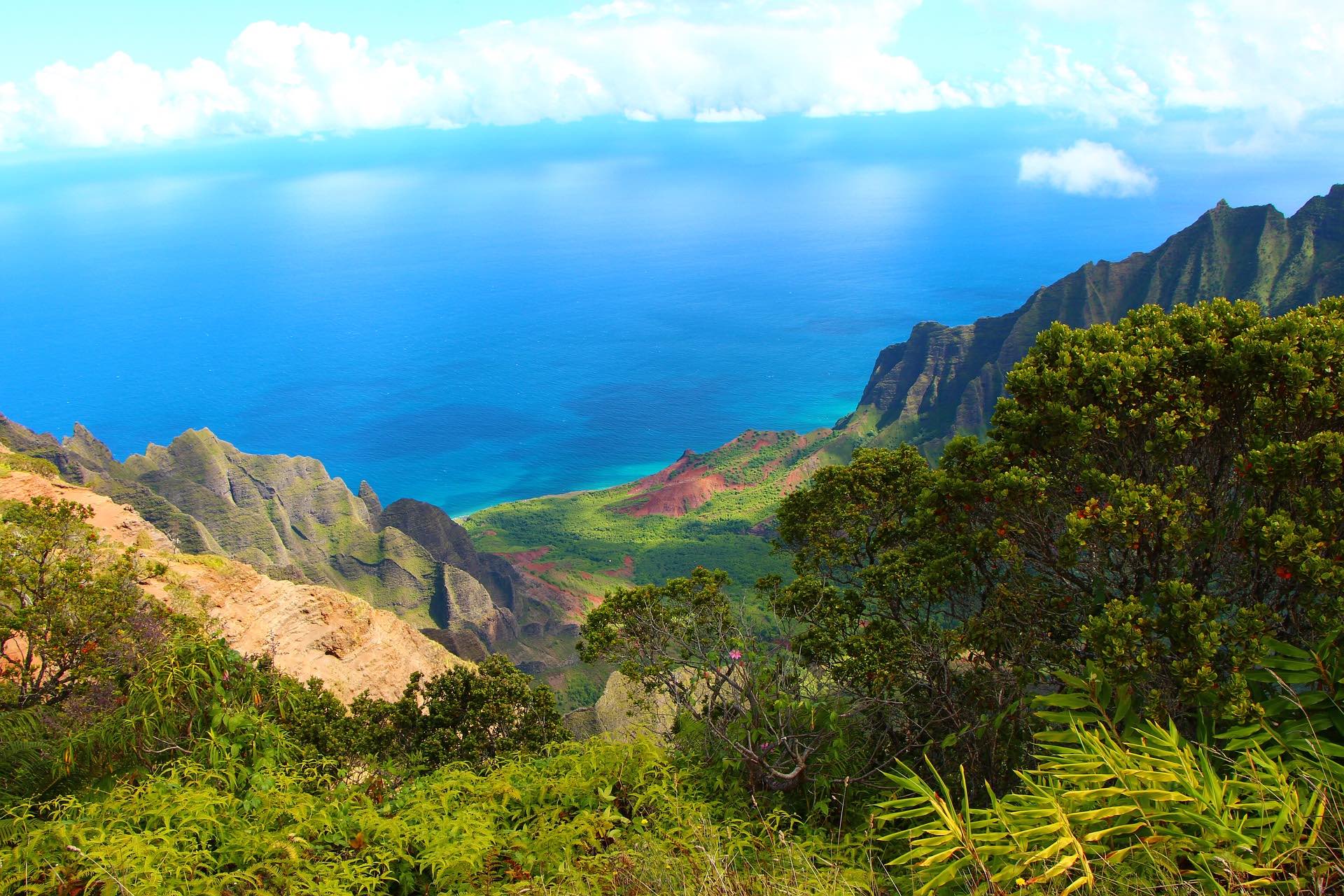 a view of a mountain range and the ocean