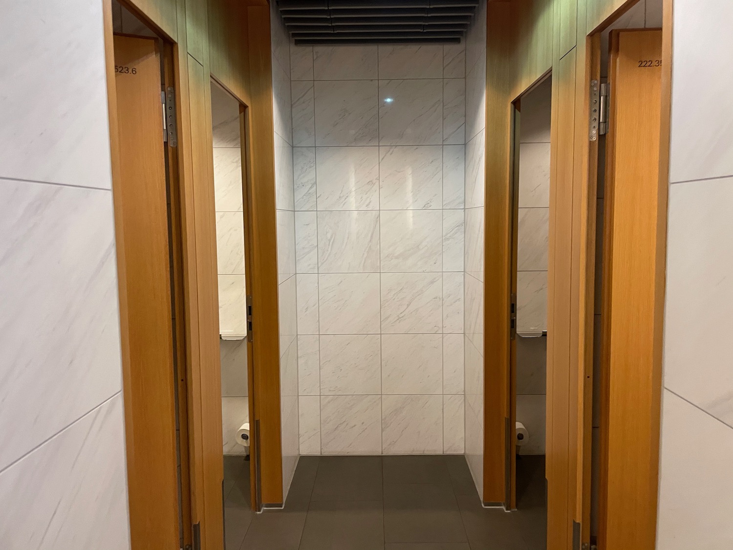 a bathroom with doors open