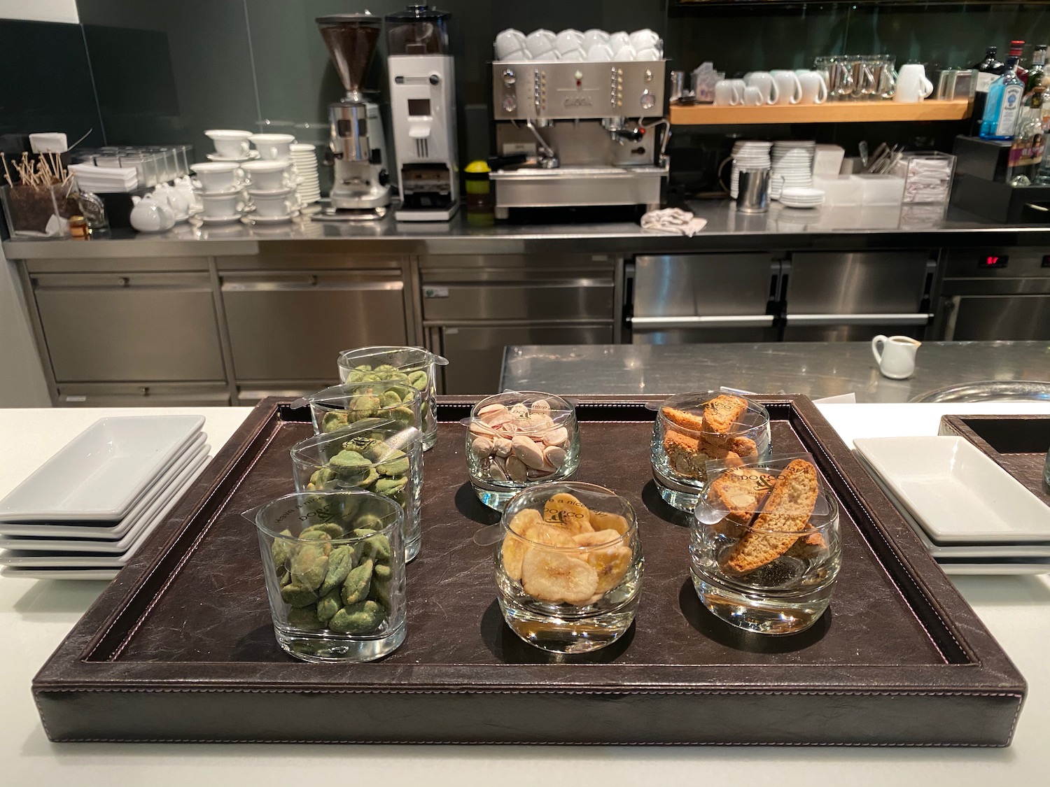 a tray with food in glasses