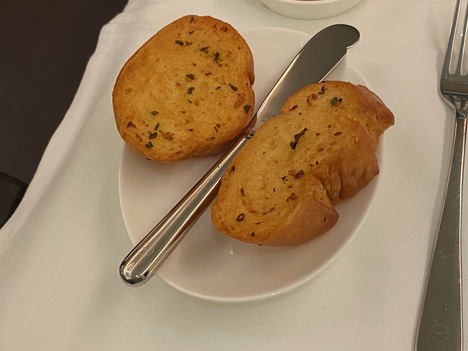 a plate of food with knife and fork