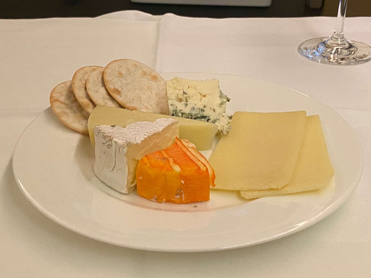 a plate of cheese and crackers