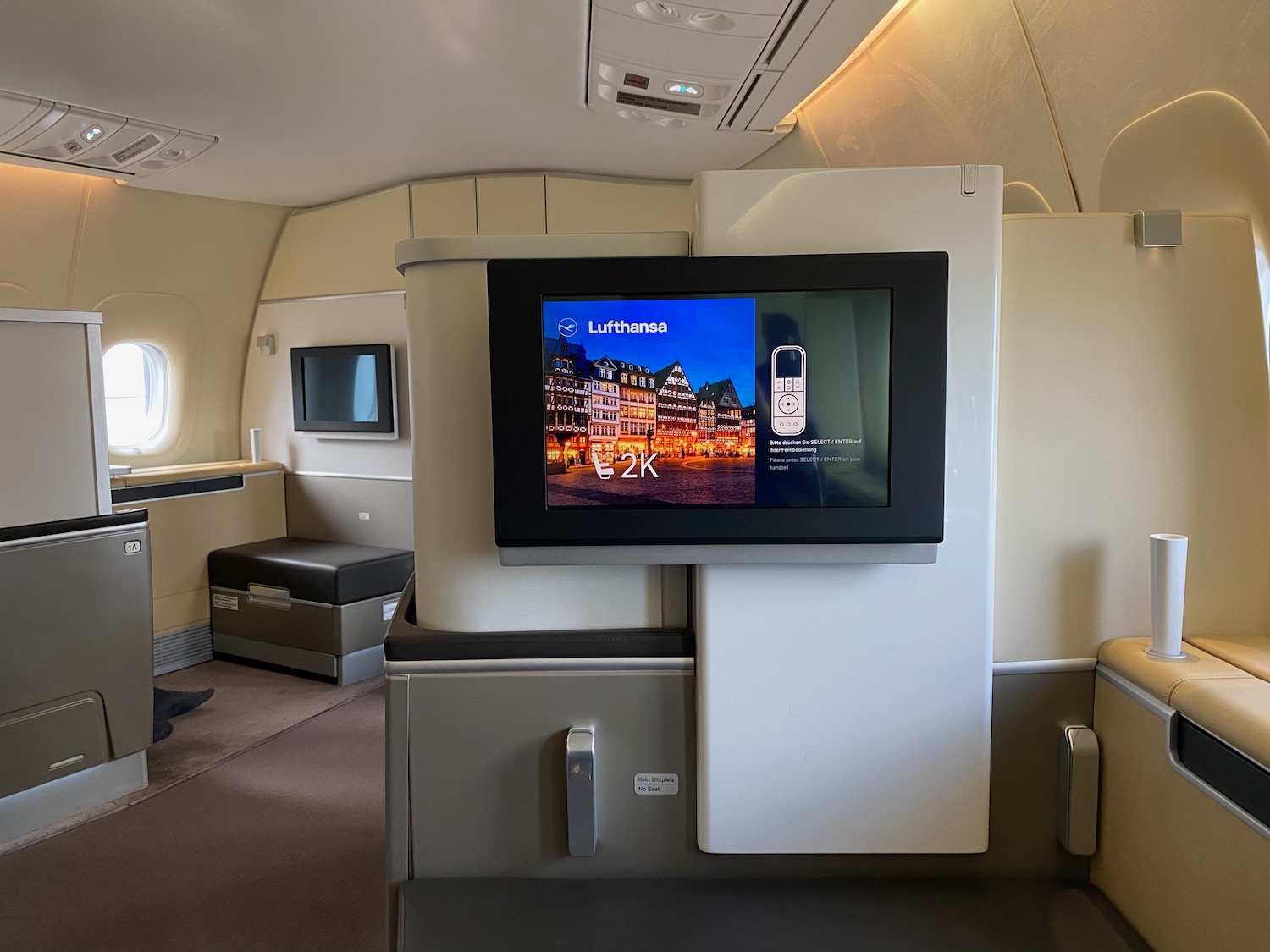 a tv on a wall in a plane