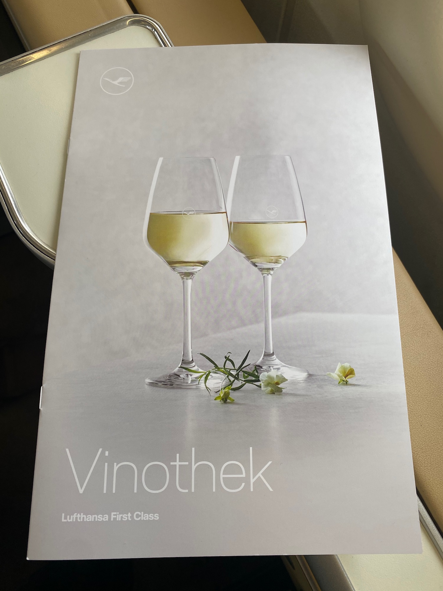 a book with two glasses of wine