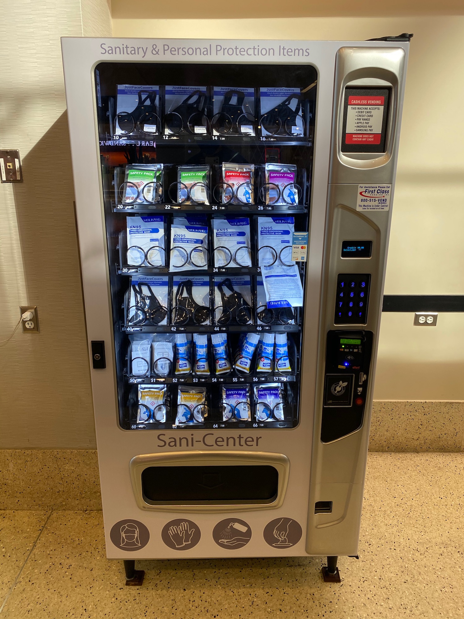 a vending machine with various items on shelves