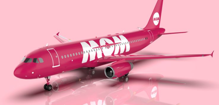 a pink airplane with white text on it