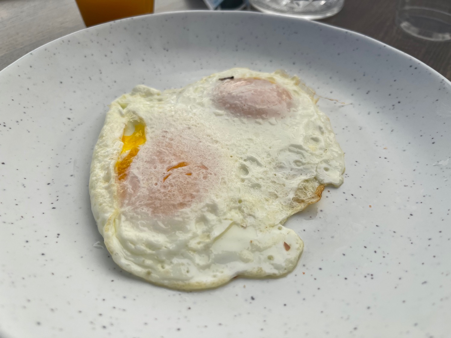 a plate with two eggs on it