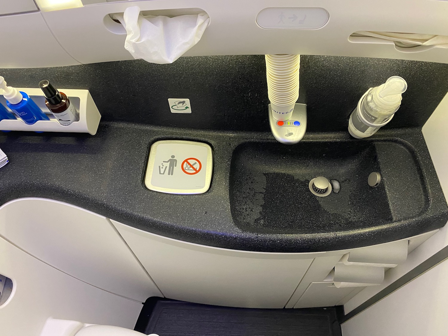 a sink and faucet in an airplane