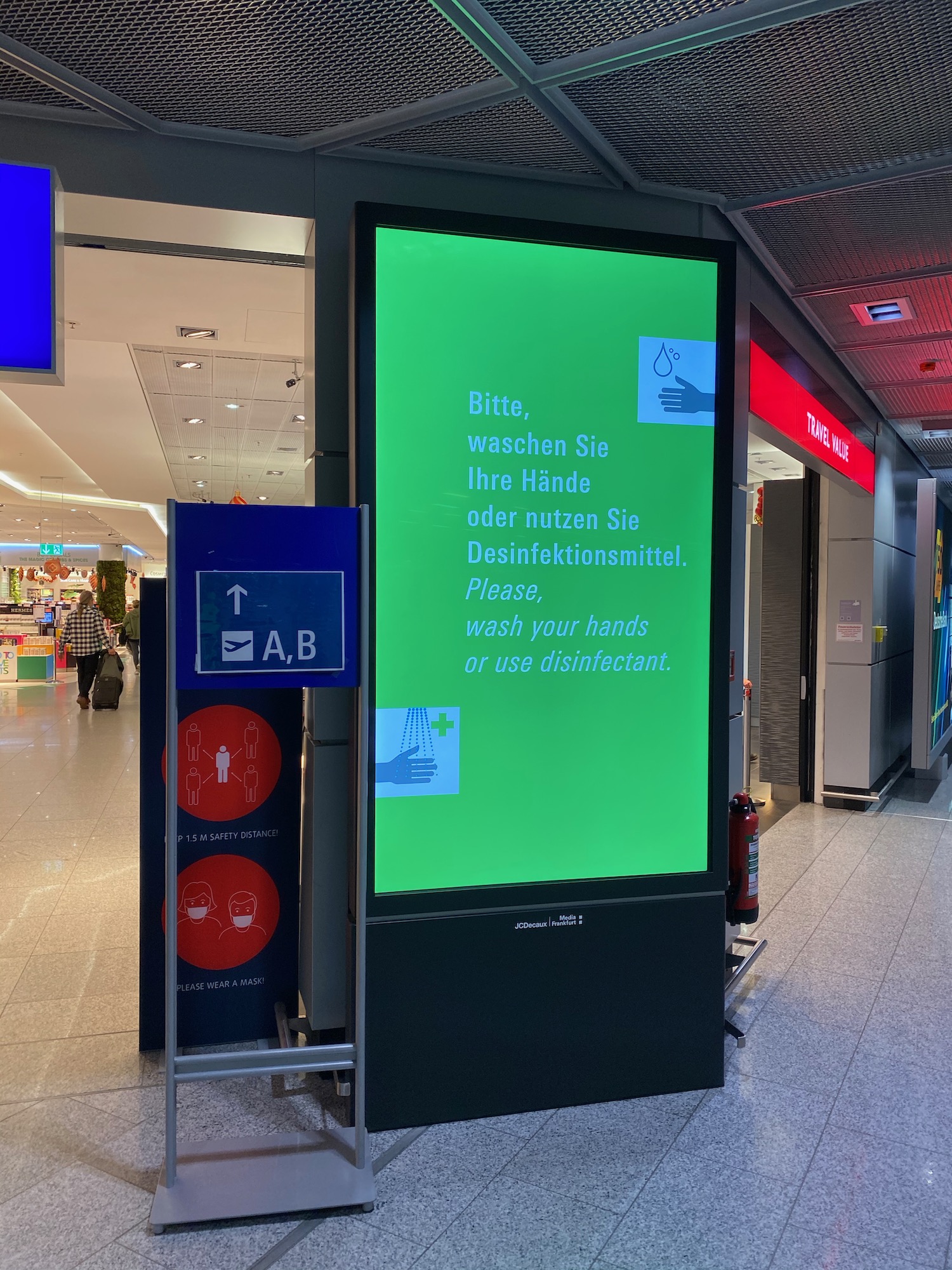 a large green screen in a mall