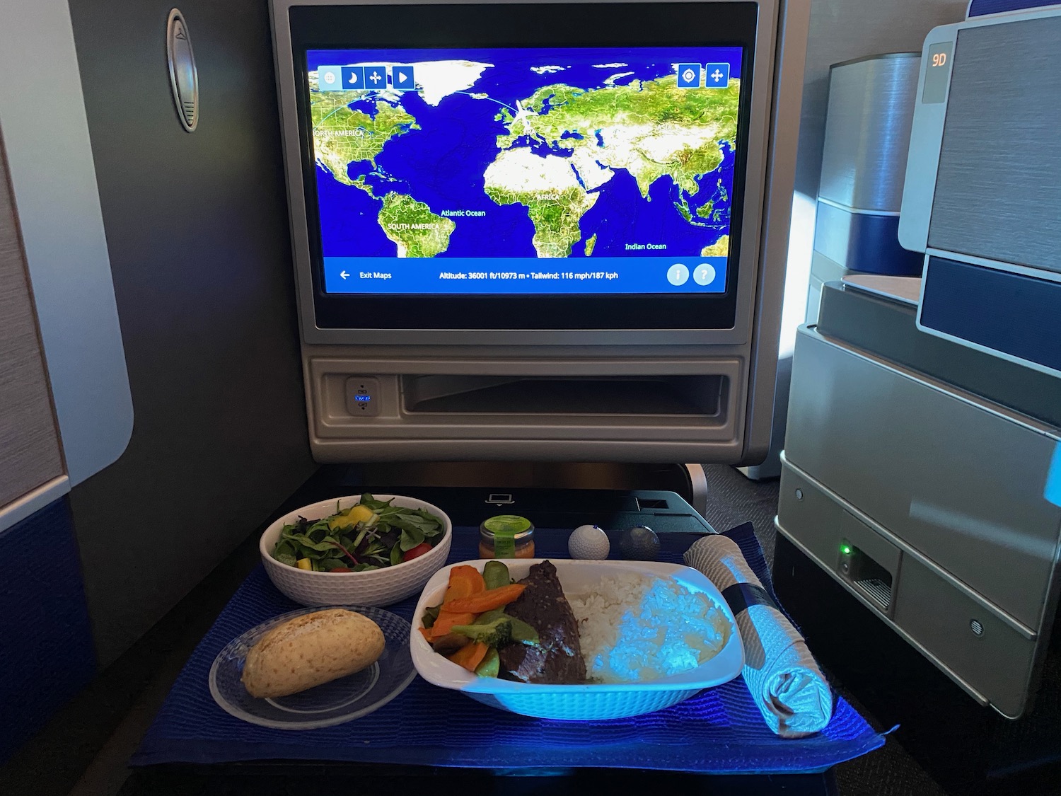 a food on a tray in front of a television