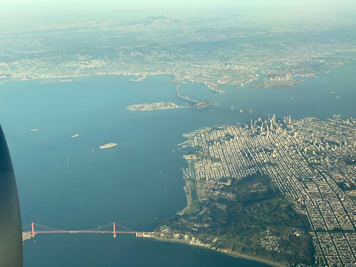 an aerial view of a city and water