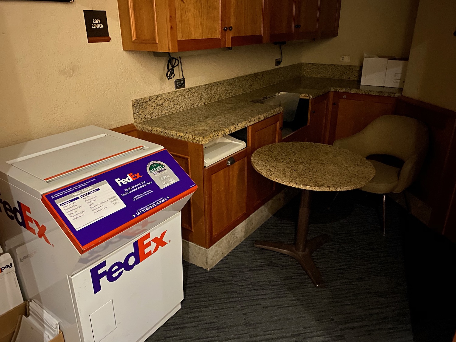 a box with a logo on it next to a table