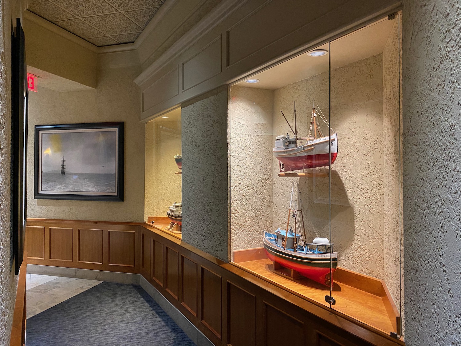 a display case with boats in it