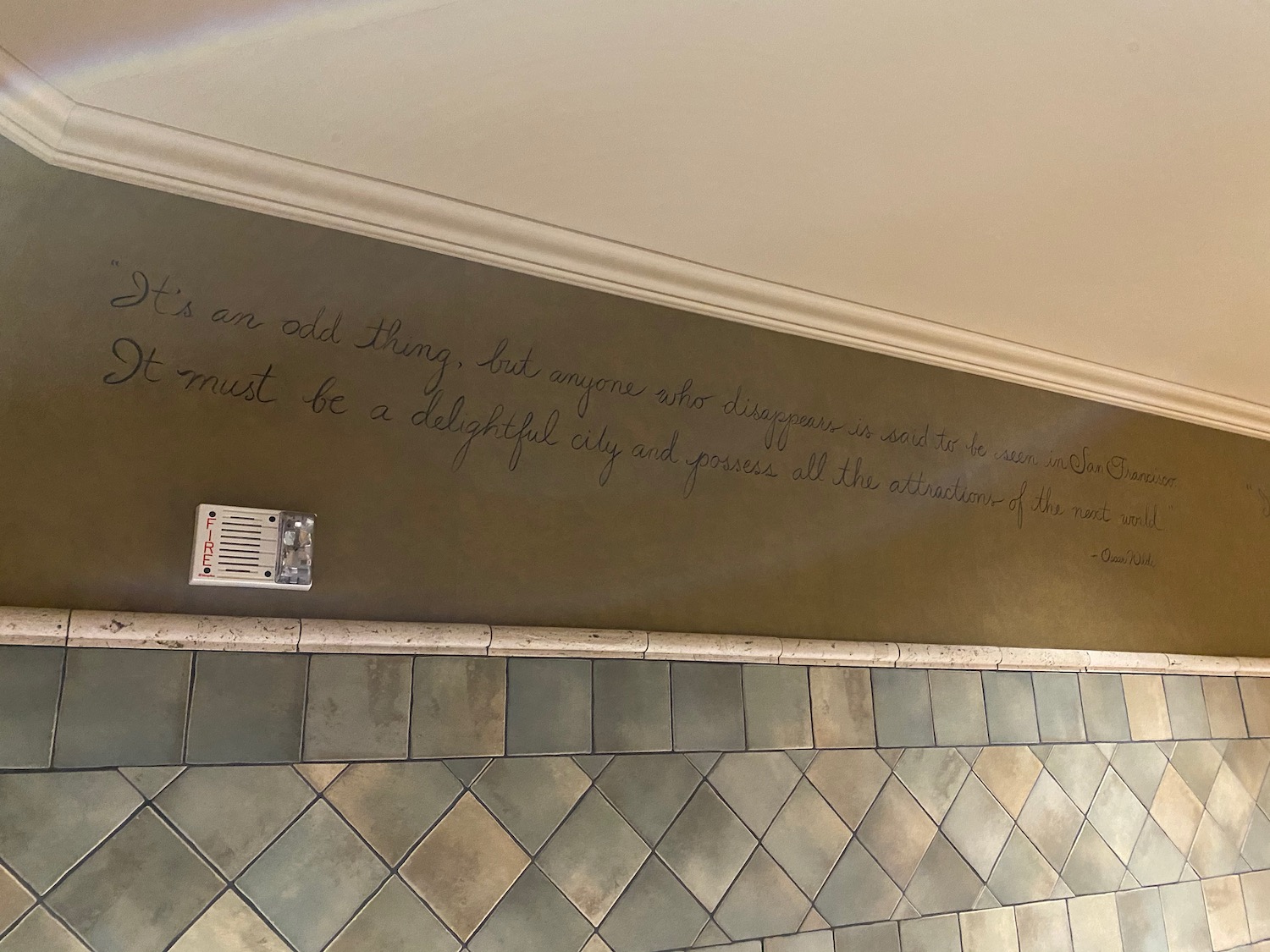 a wall with writing on it