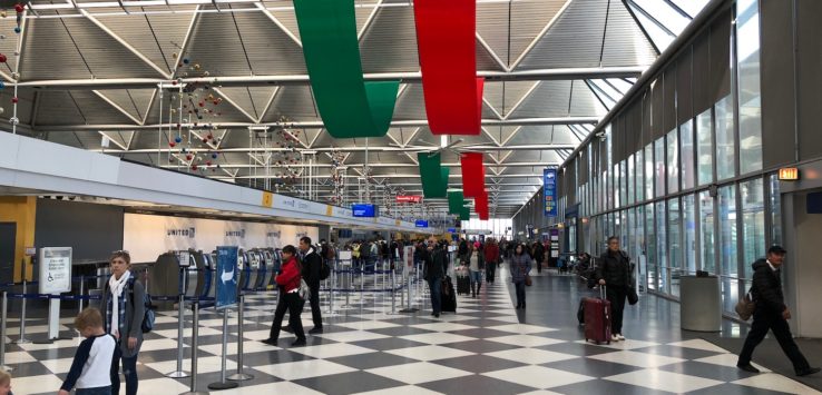 a group of people in a terminal